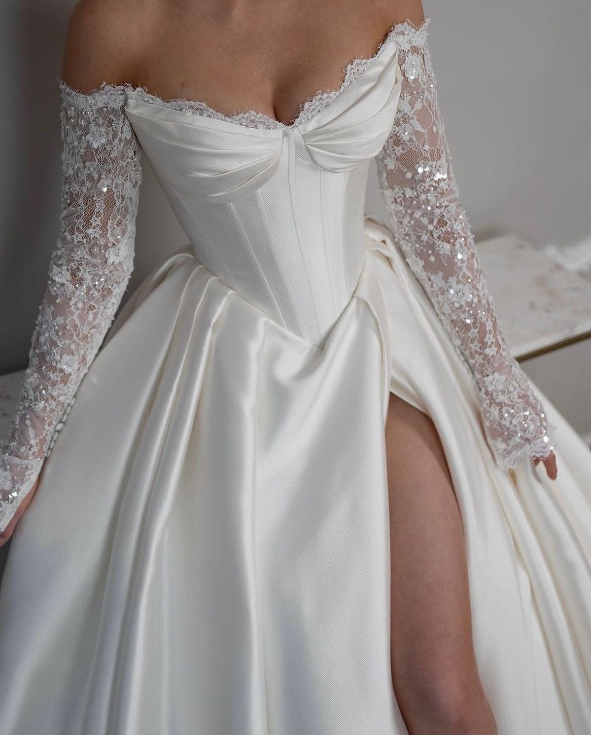 Long Sleeve Corset Style Satin Wedding Dress with slit